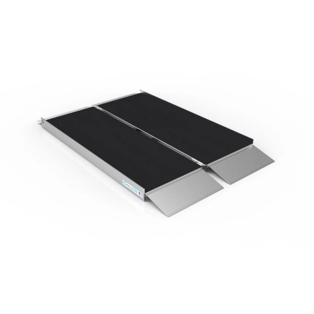 The EZ-Access SUITCASE® Singlefold AS Portable Ramp features a black slip-resistant surface, silver edges, and is shown partially extended with inclines at both ends for easy access.